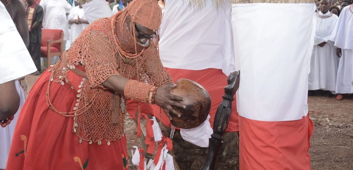 Oba of Benin makes requests at ancestral altars