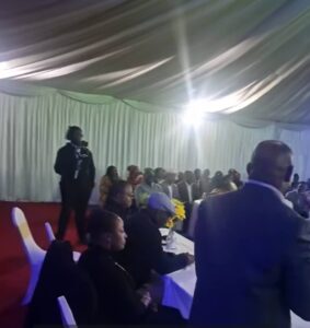 Governor Godwin Obaseki with his wife, Betsy sitting with guests at the event in Manchester.